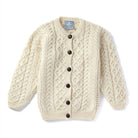 Kids Aran cream cardigan with buttons, full front view.
