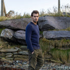 IDH Fisherman sweater on man, side view