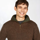 Man wearing earth brown half-zip sweater from Ireland's Eye Knitwear