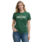 Woman wearing a green t-shirt with 'IRELAND' printed on it