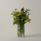 Wildflowers in a square jam jar
