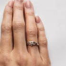 Woman's hand with trinity knot ring